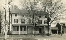 In 1779, Jacob Drake Jr. took over this beautiful old farmhouse, which was built around 1752, at the crossroads of Oakdale Road, Dover Chester Road and Main Street.  He converted it into an inn.  A few of the names it has held during its 183 years of operation were Jacob Drake's Tavern, Crossroads Hotel, Union Hotel, Flagstaff Inn, and Dean's Crossroads Inn.  After it burned down in 1962, the lot sat empty for some time until the Immediate Medical Care Center was built.