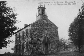Benjamin McCourry and Nathan Cooper built this stone schoolhouse on Sept. 15, 1830 at what has been referred to as the Crossroads.  The building is believed to have been jointly owned as the upper portion was used as a Congregational meetinghouse and the lower room was the schoolhouse.  This was school district number two and Josephine Langdon was the teacher.  Along Dover Chester Road, this old stone schoolhouse is now a private residence with a recent addition.
